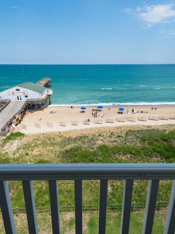 On the beach, sun loungers, beach umbrellas, fishing
