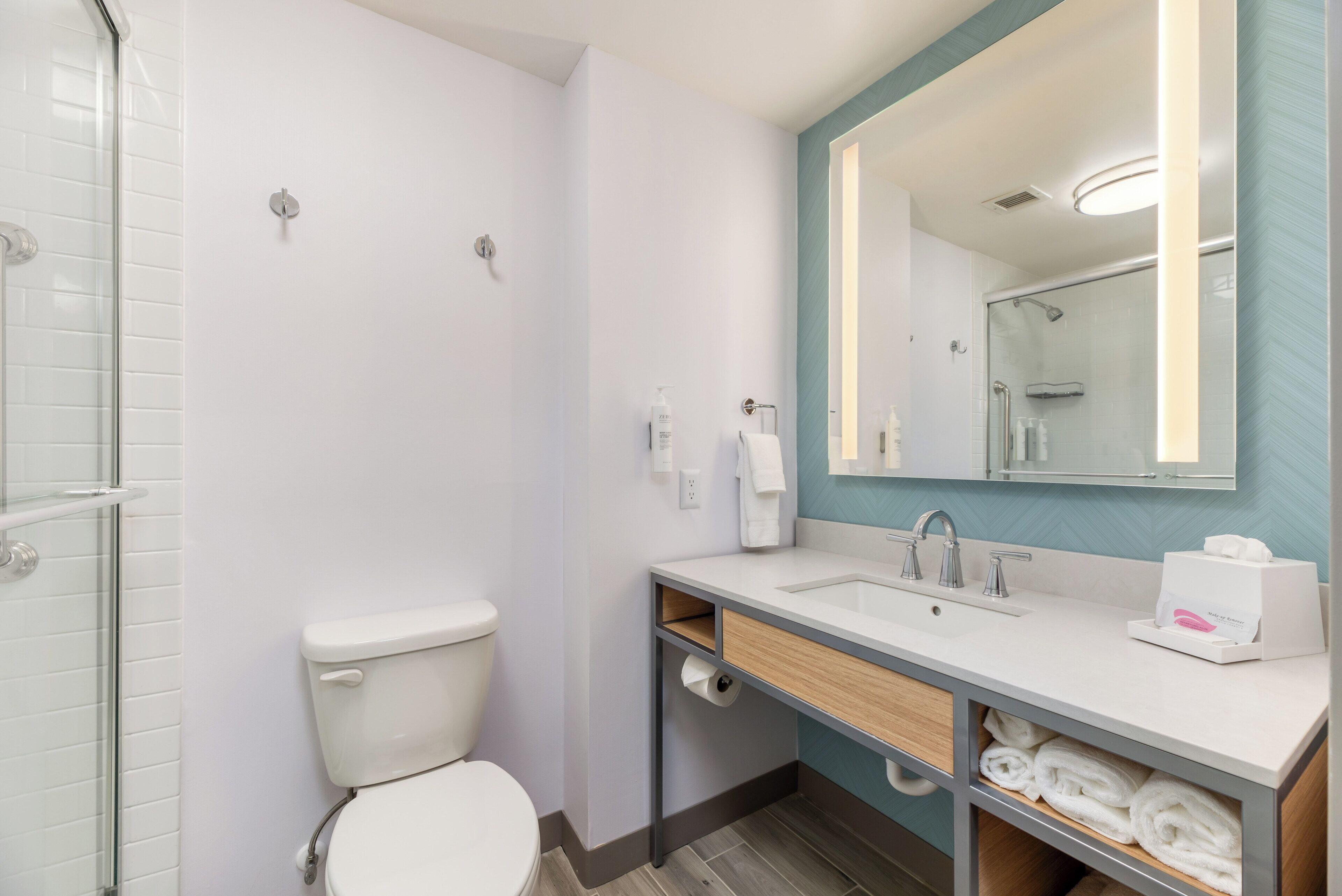 combined shower/bathtub, free toiletries, hair dryer, towels