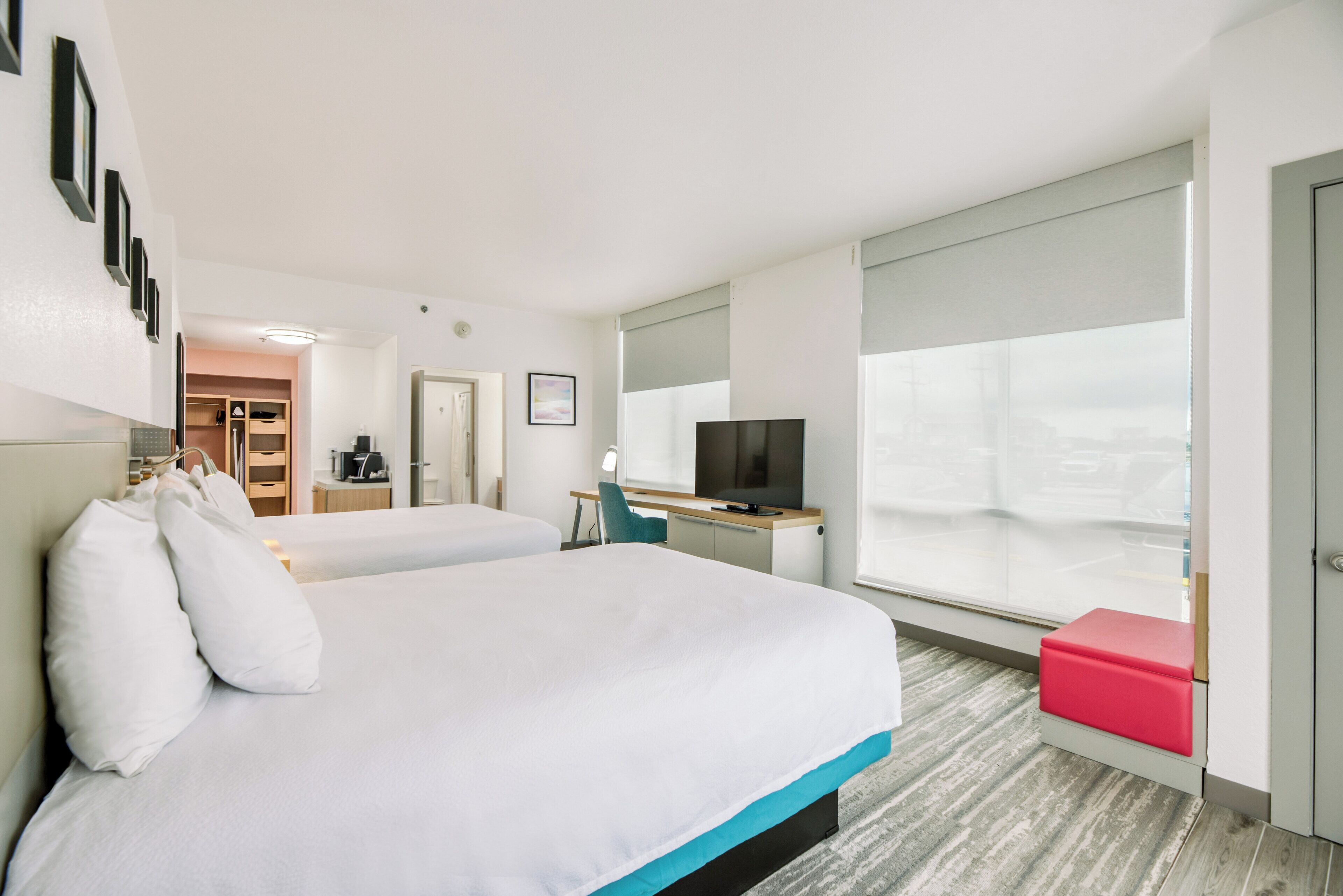 deluxe room, 2 queen beds, patio, ground floor | premium bedding, in-room safe, desk, iron/ironing board