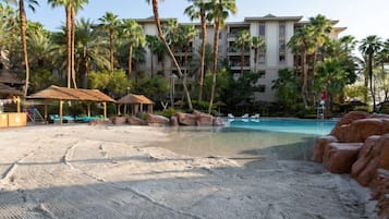 Outdoor pool, sun loungers, lifeguards on site