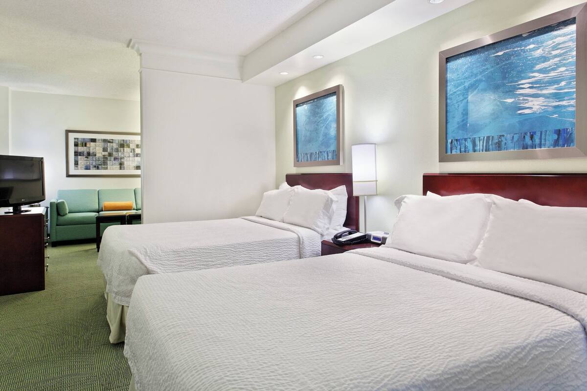 premium bedding, desk, blackout curtains, iron/ironing board