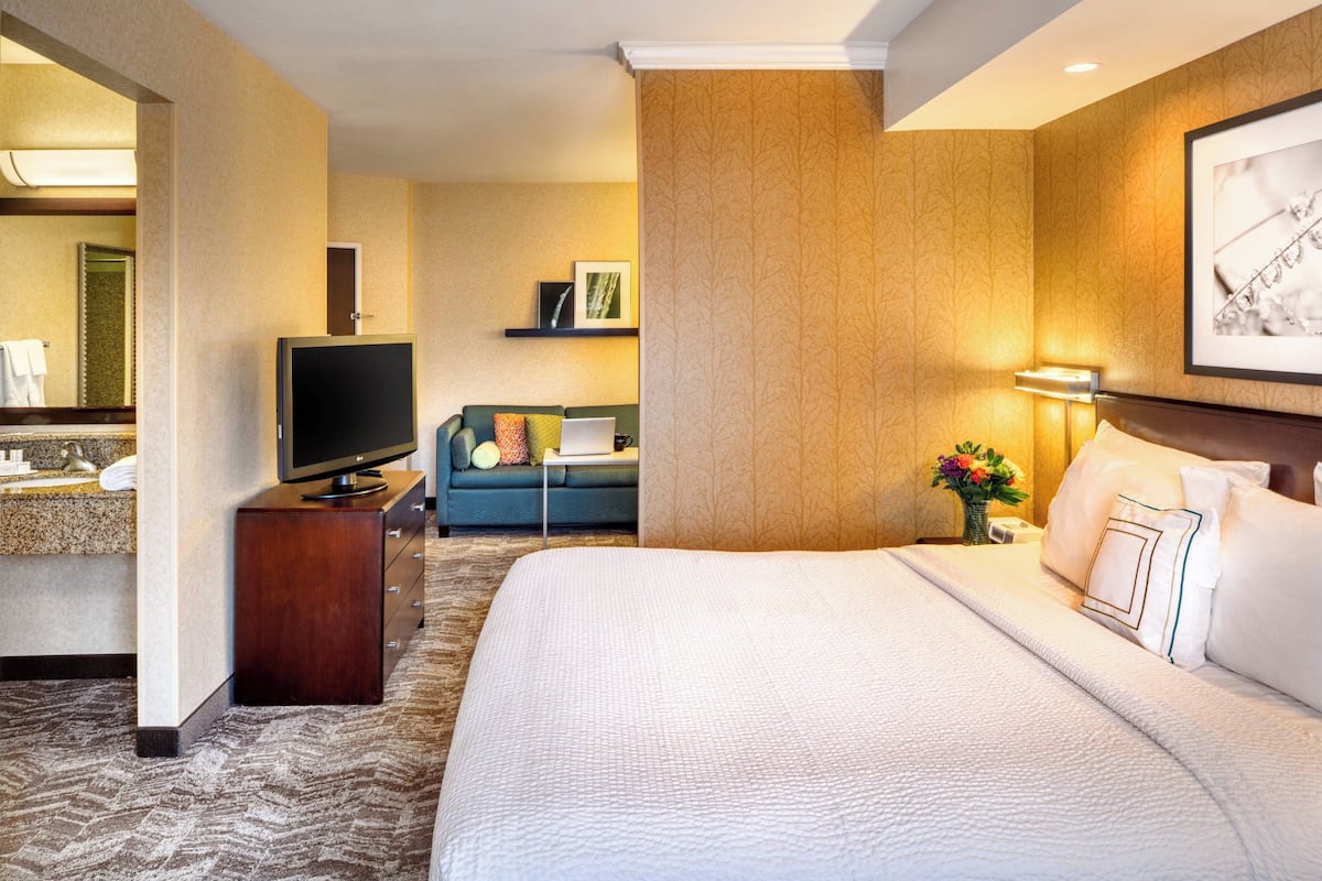 hypo-allergenic bedding, desk, laptop workspace, iron/ironing board