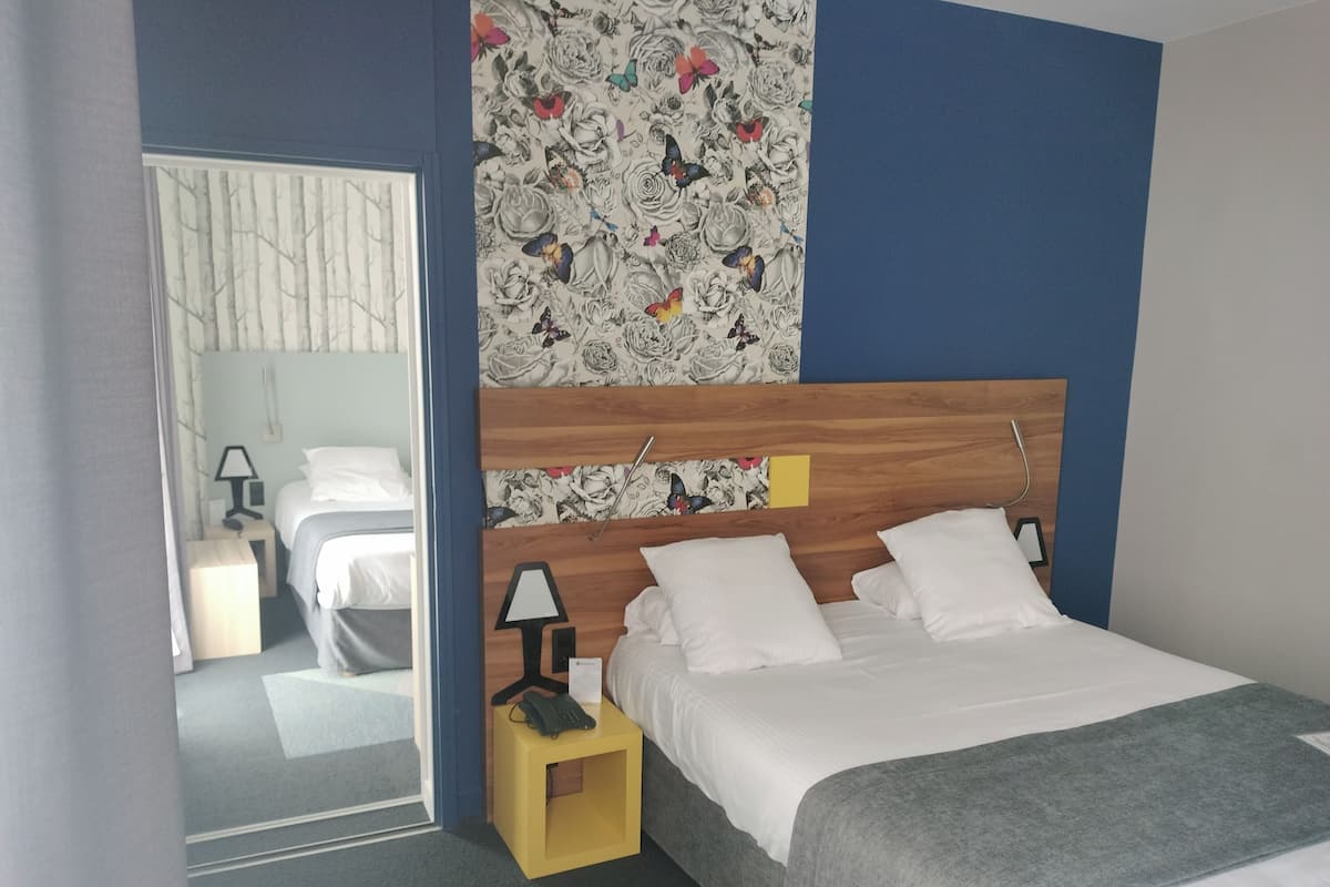 Standard Room, 2 Queen Beds, Non Smoking | In-room safe, individually furnished, desk, blackout drapes