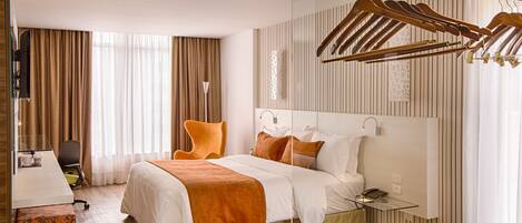 Hypo-allergenic bedding, minibar, in-room safe, desk