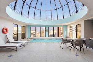 Indoor pool, sun loungers