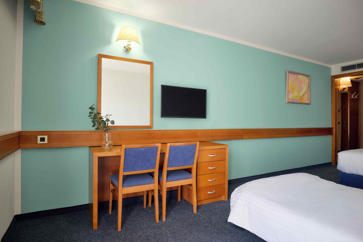 Desk, blackout drapes, iron/ironing board, free WiFi