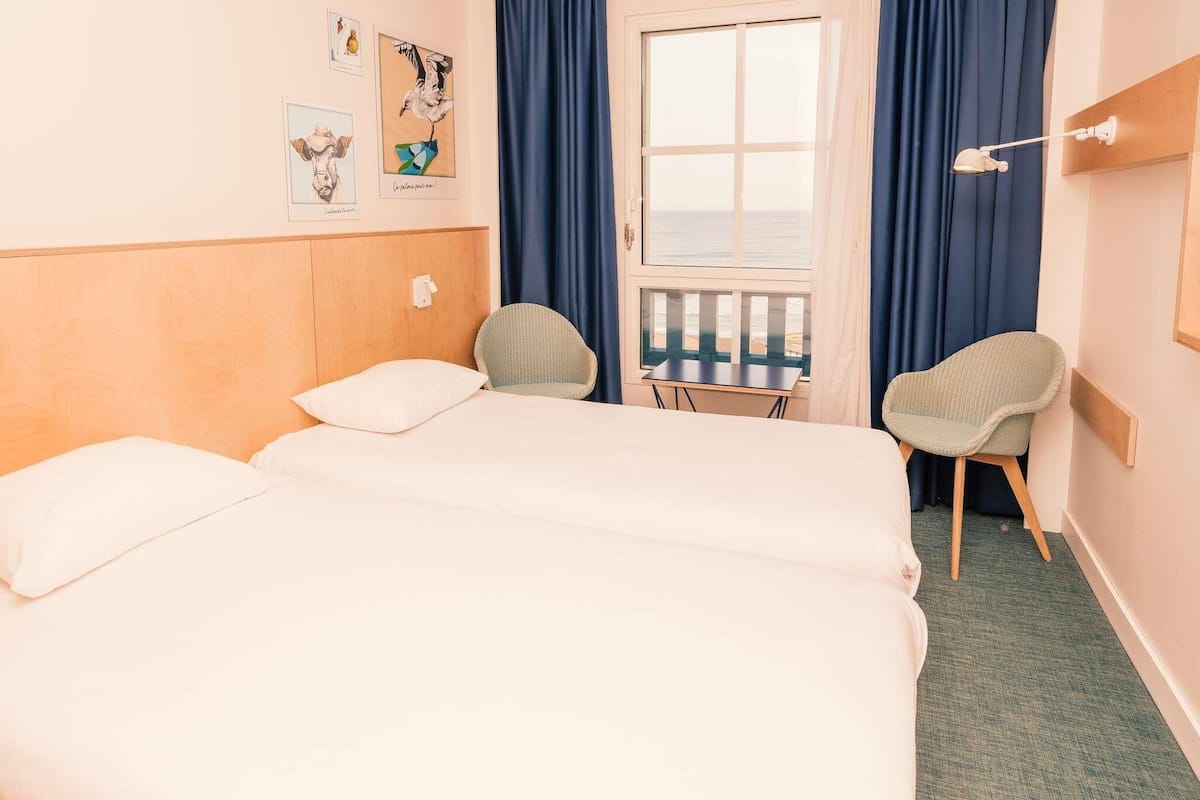 Standard Room, 2 Single Beds, Sea View | Blackout curtains, soundproofing, iron/ironing board, travel cot