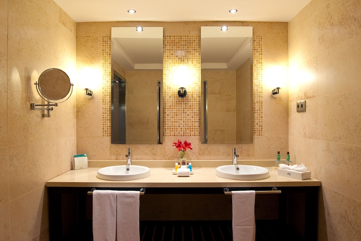 deep-soaking bathtub, free toiletries, hair dryer, bathrobes