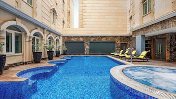 Outdoor pool, open 8:00 AM to 8:00 PM, sun loungers