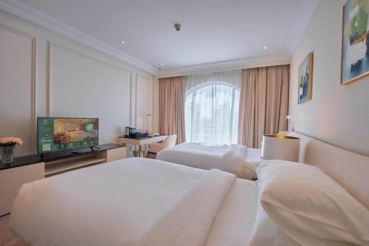 Quarto premium, 2 camas de solteiro | Frigobar, cofres nos quartos, escrivaninha, cortinas blackout