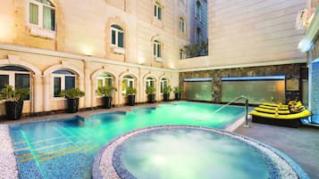 Outdoor pool, open 8:00 AM to 8:00 PM, sun loungers