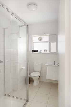 One Bedroom Apartment (1 King Bed or 2 Single Beds) | Bathroom | Shower, free toiletries, hair dryer, towels - MAC South Yarra by Melbourne Apartment Collection (South Yarra)