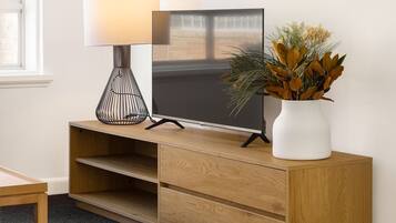 One Bedroom Apartment (1 King Bed or 2 Single Beds) | Living area | 32-inch flat-screen TV with digital channels, LCD TV