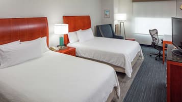 Premium bedding, down comforters, pillowtop beds, in-room safe