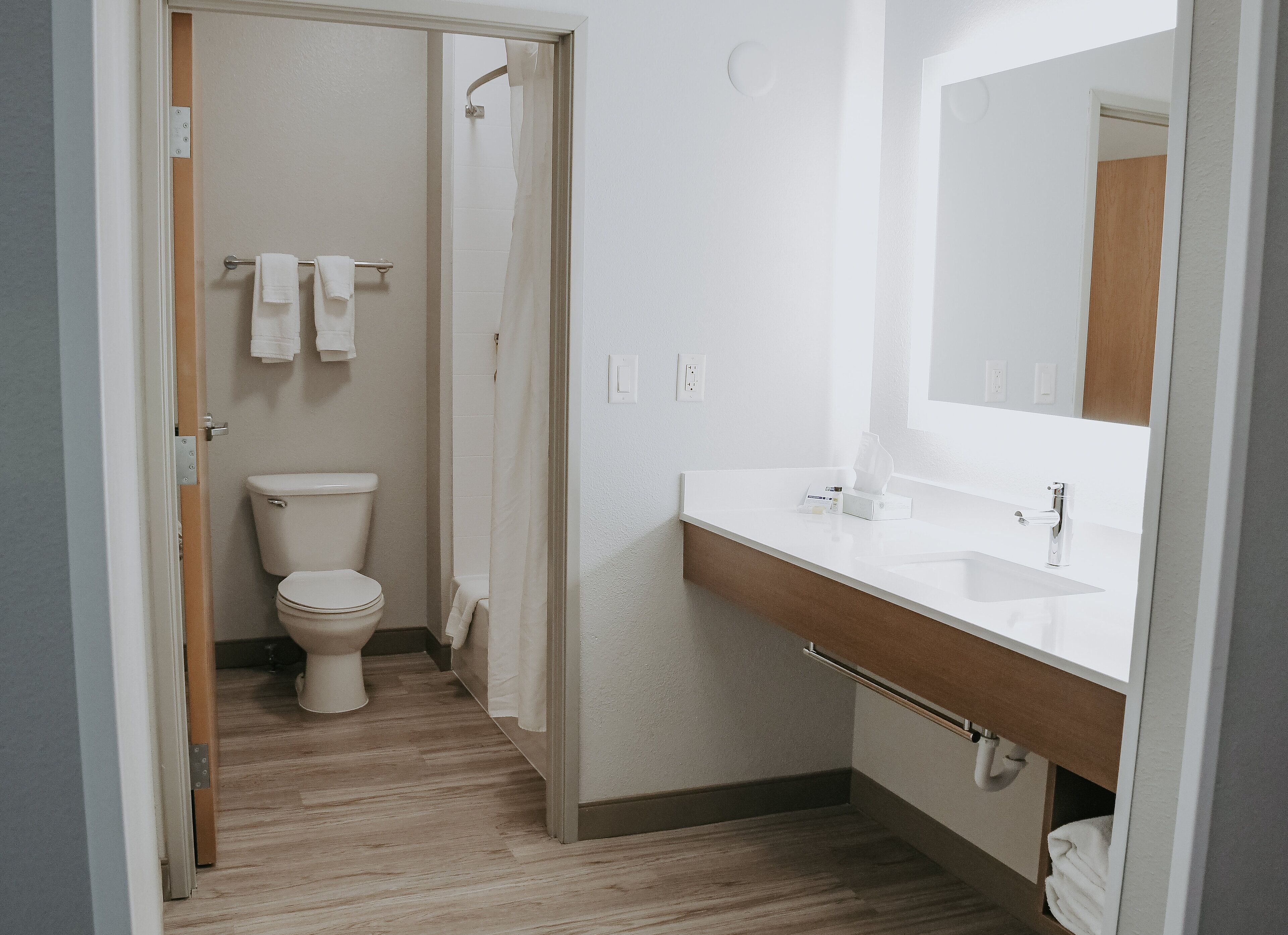 combined shower/bathtub, free toiletries, hair dryer, towels