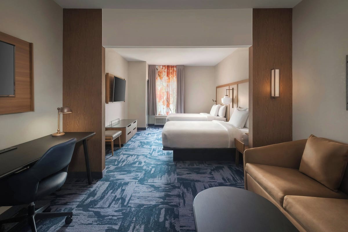 Hypo-allergenic bedding available, in-room safe, desk, laptop workspace