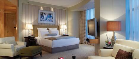 Premium bedding, down comforters, minibar, in-room safe