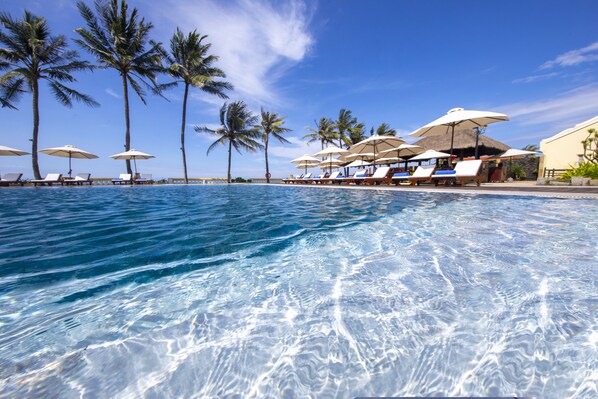 Outdoor pool, open 6 AM to 10 PM, pool umbrellas, sun loungers - Victoria Hoi An Beach Resort & Spa (Da Nang)