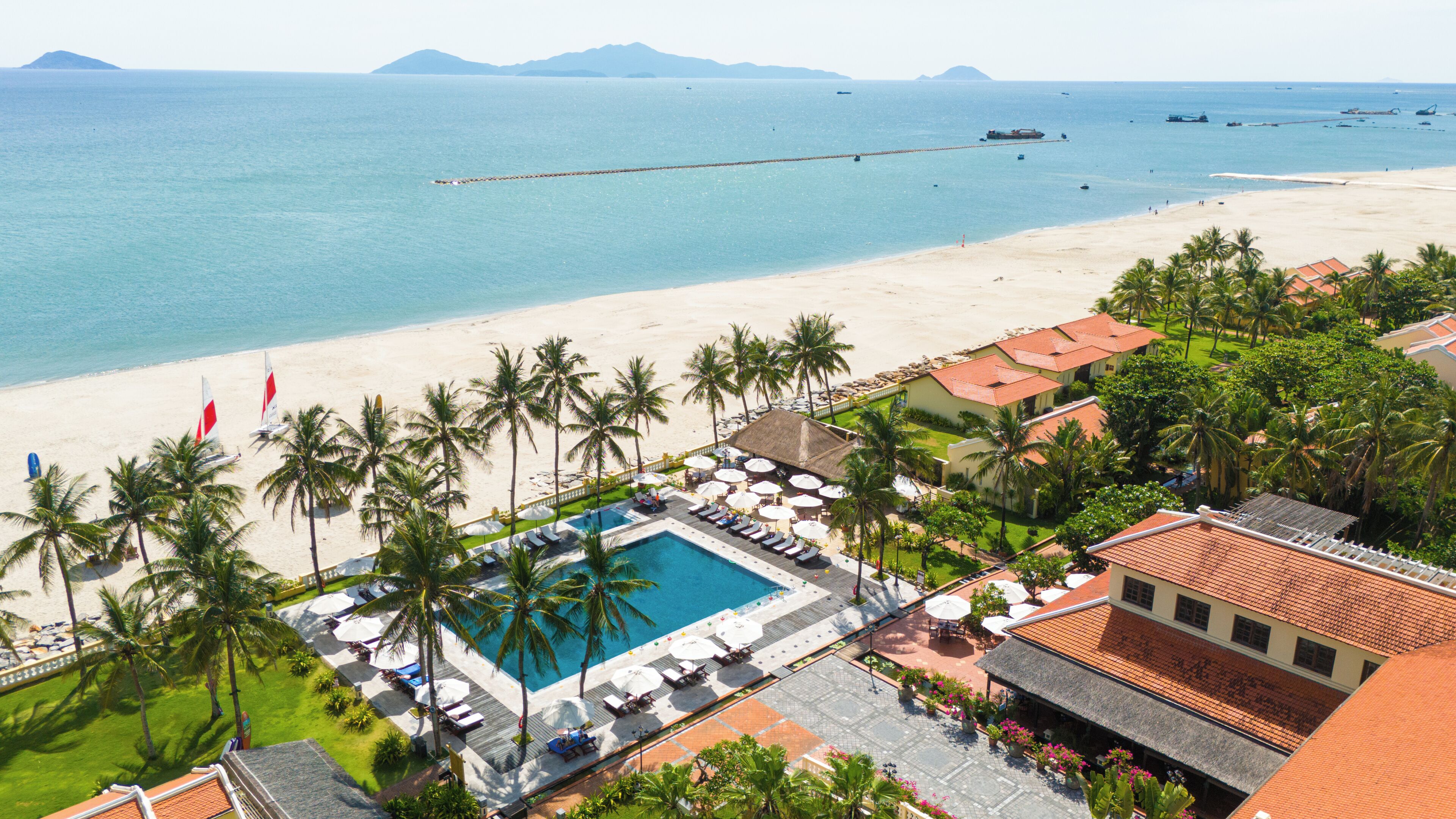 Private beach, beach umbrellas, beach towels, beach volleyball
