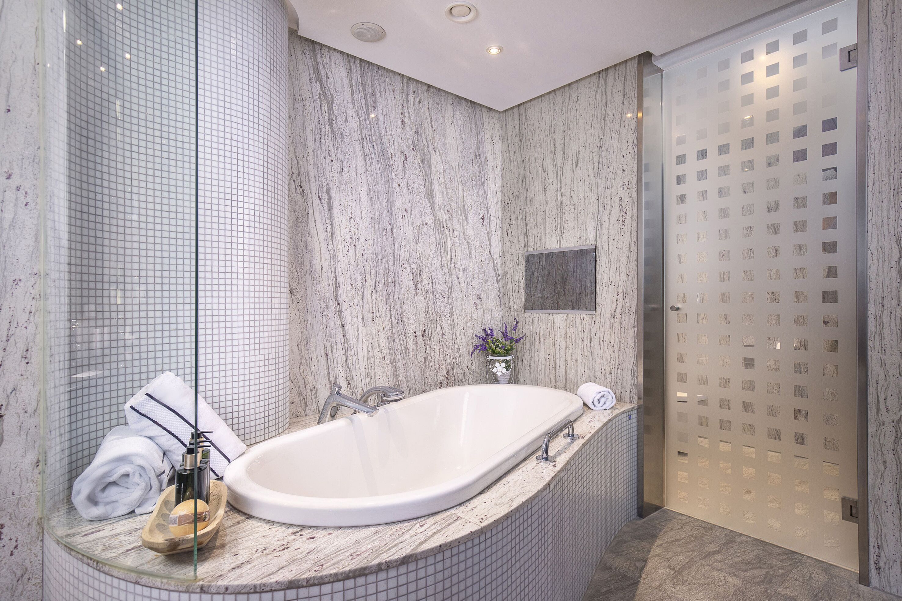 separate bathtub and shower, free toiletries, hair dryer, towels