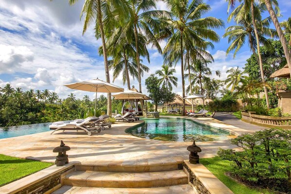 Outdoor pool, pool umbrellas, pool loungers