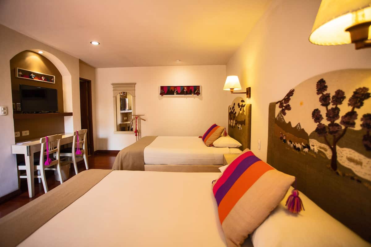 comfort double room, 2 queen beds | in-room safe, individually decorated, desk, laptop workspace