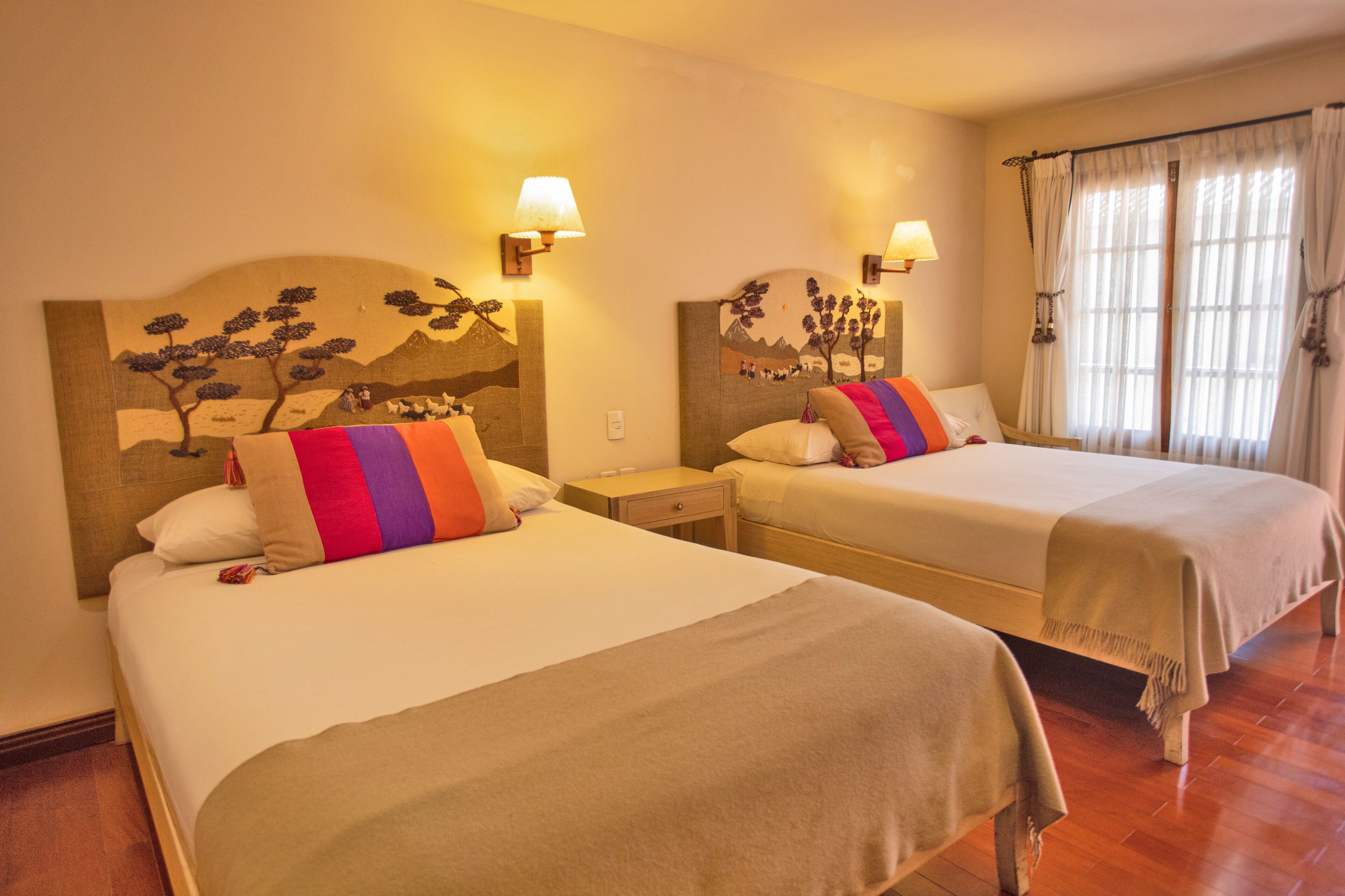 comfort double room, 2 queen beds | in-room safe, individually decorated, desk, laptop workspace