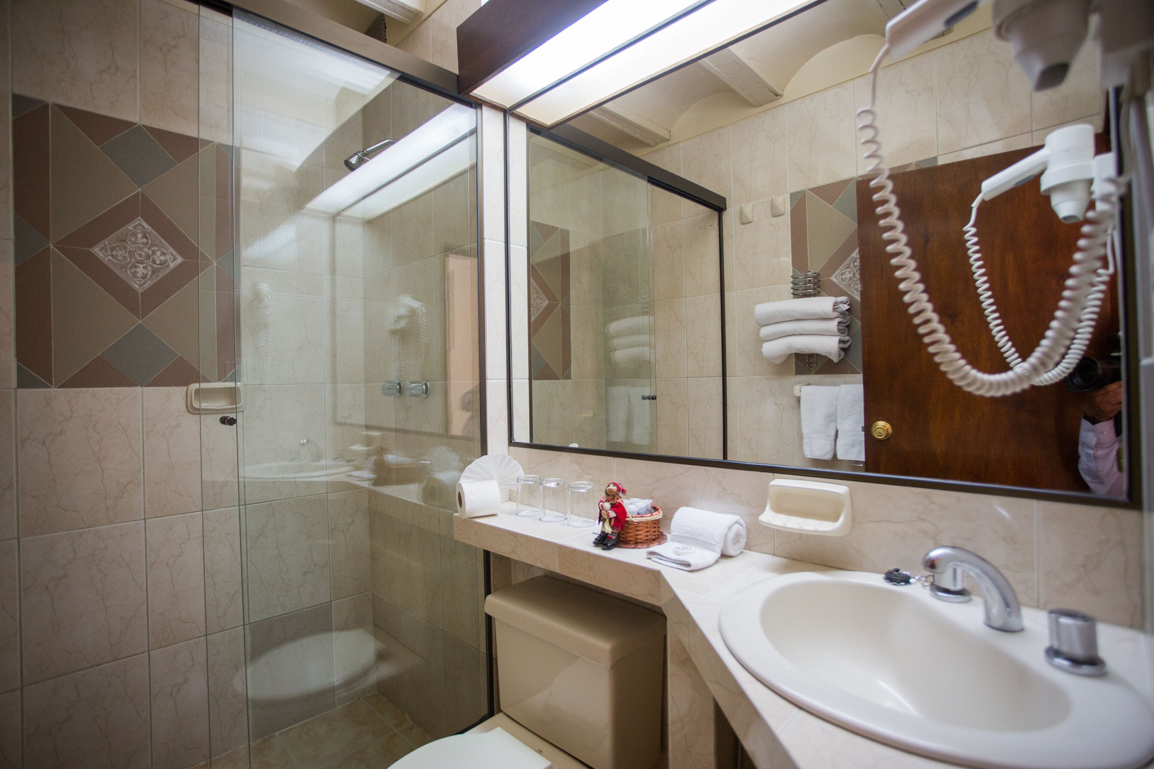 triple room | bathroom | rainfall showerhead, free toiletries, hair dryer, towels