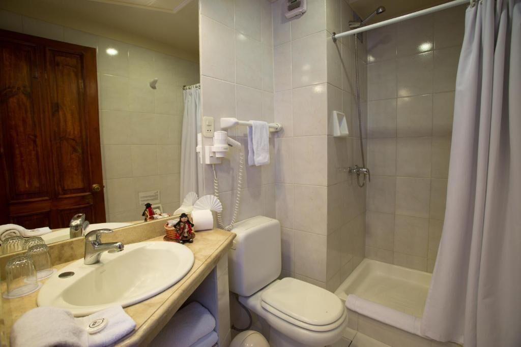 double room, 1 king bed | bathroom | rainfall showerhead, free toiletries, hair dryer, towels