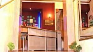 A hotel entrance with a sign reading "HD". - Hotel Diethnes (Athens)