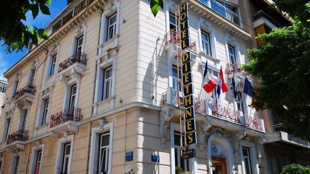 A historic building with a sign reading "HOTEL DE VILLE". - Hotel Diethnes (Athens)