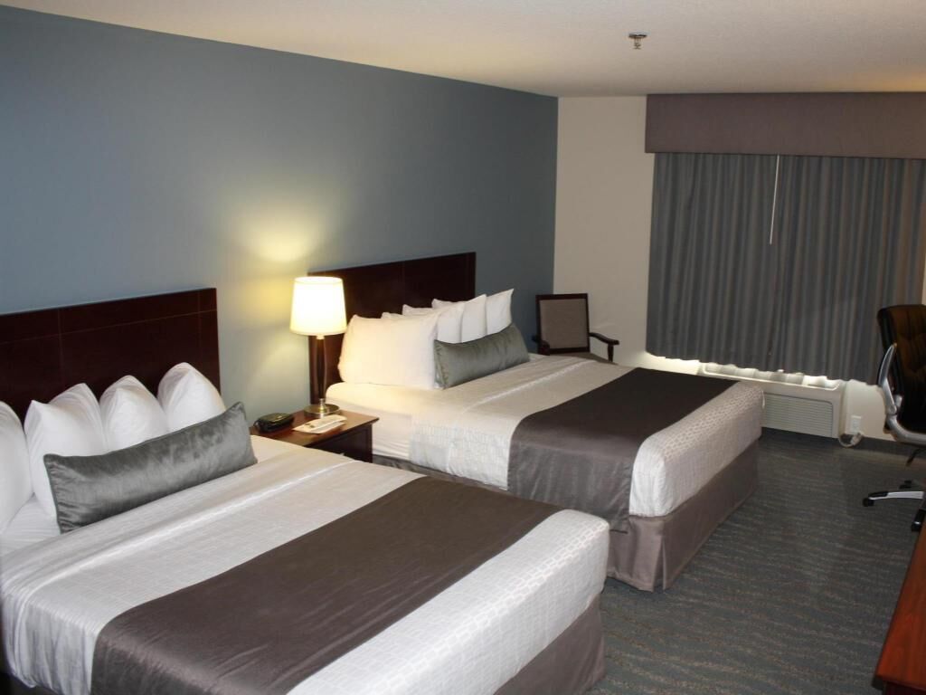 Pillowtop beds, desk, laptop workspace, blackout drapes