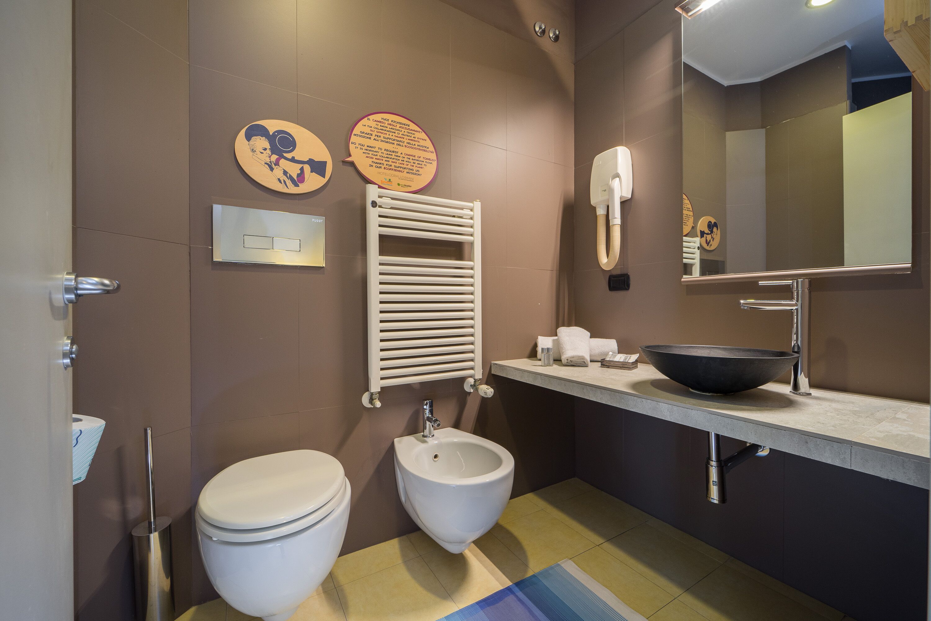 free toiletries, hair dryer, bidet, towels