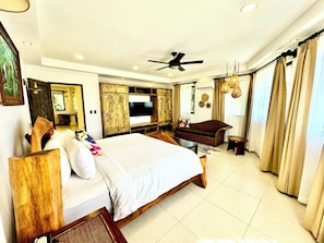 Premium bedding, down comforters, pillowtop beds, in-room safe