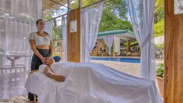 Outdoor pool, open 6:00 AM to 10:00 PM, free cabanas, pool umbrellas