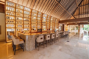 6 bars/lounges, 2 swim-up bars, beach bar