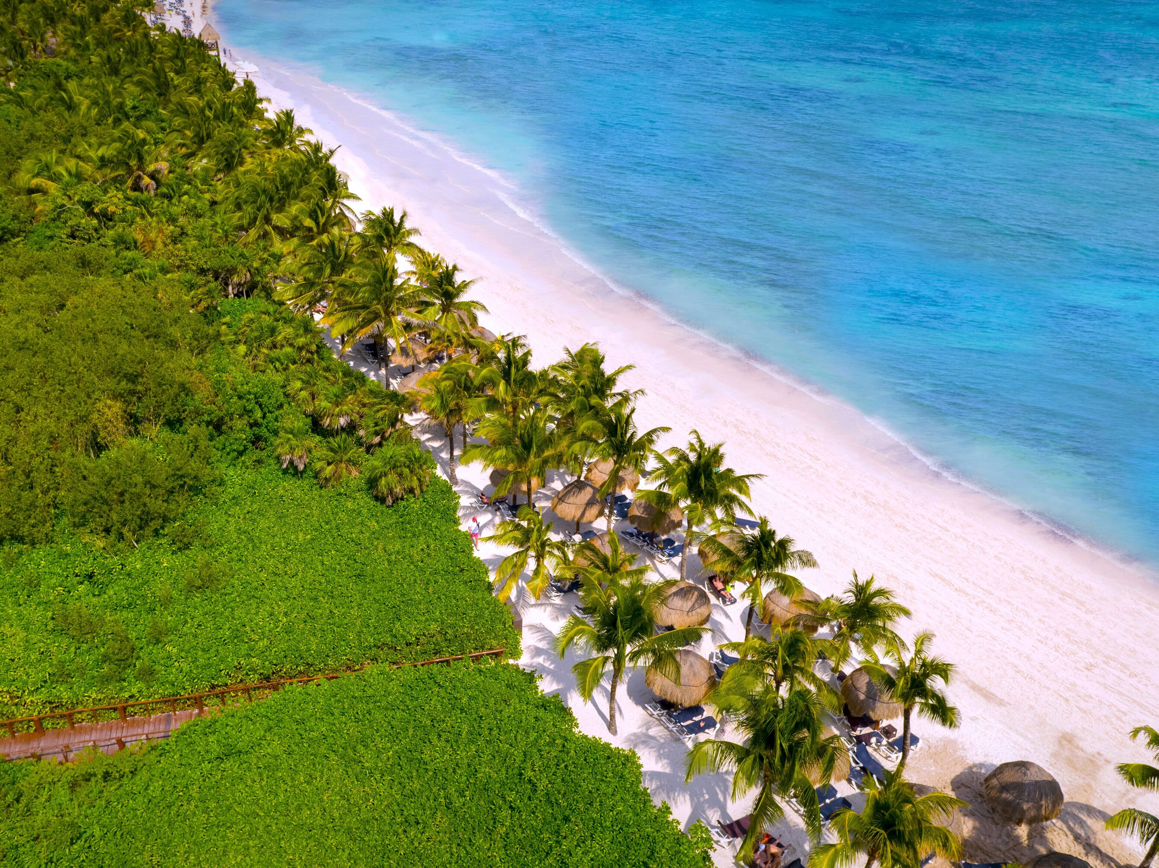 Private beach, white sand, sun loungers, beach umbrellas