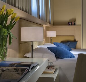 Hypo-allergenic bedding, down duvets, minibar, in-room safe