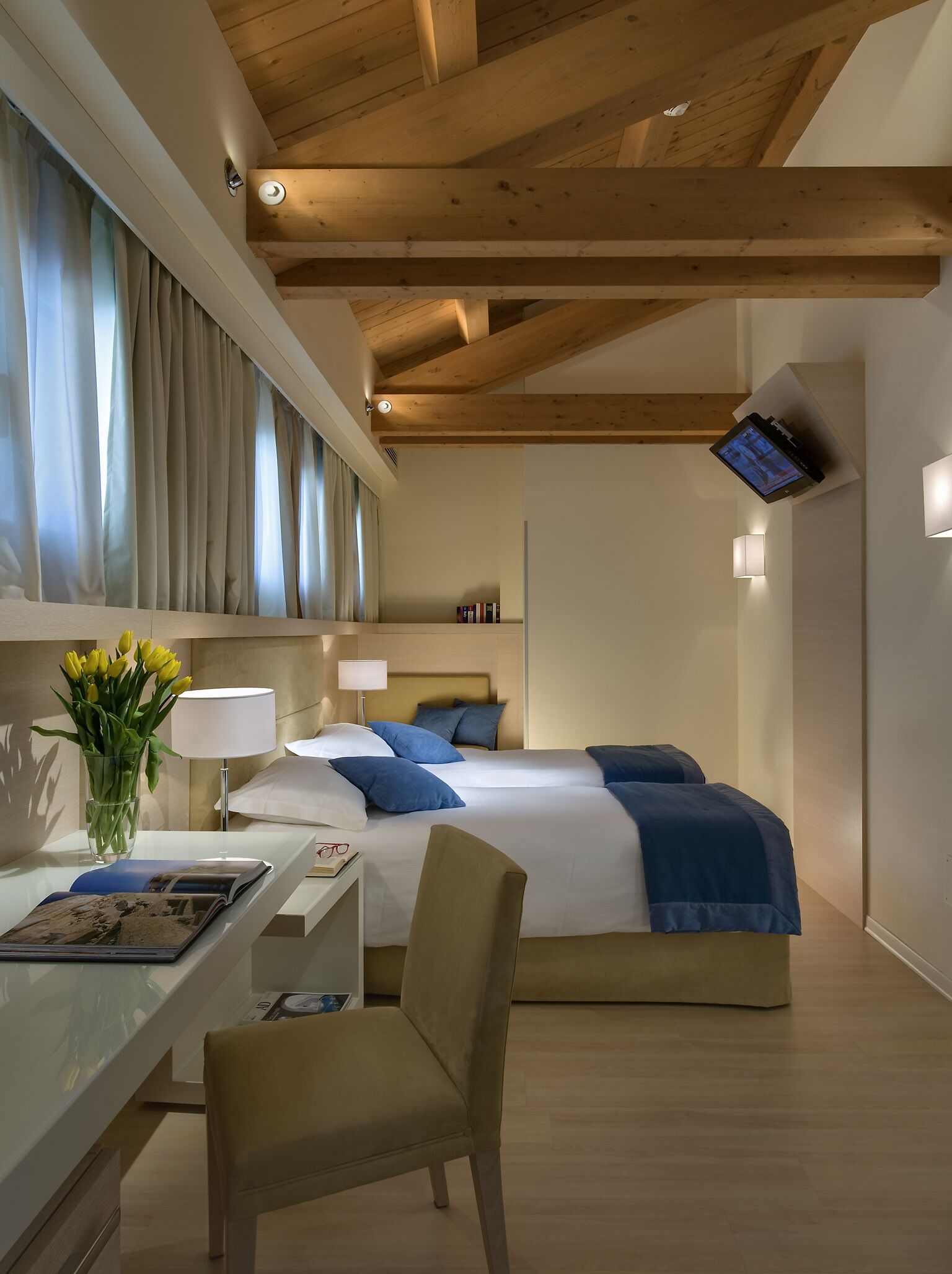 hypo-allergenic bedding, down duvets, minibar, in-room safe