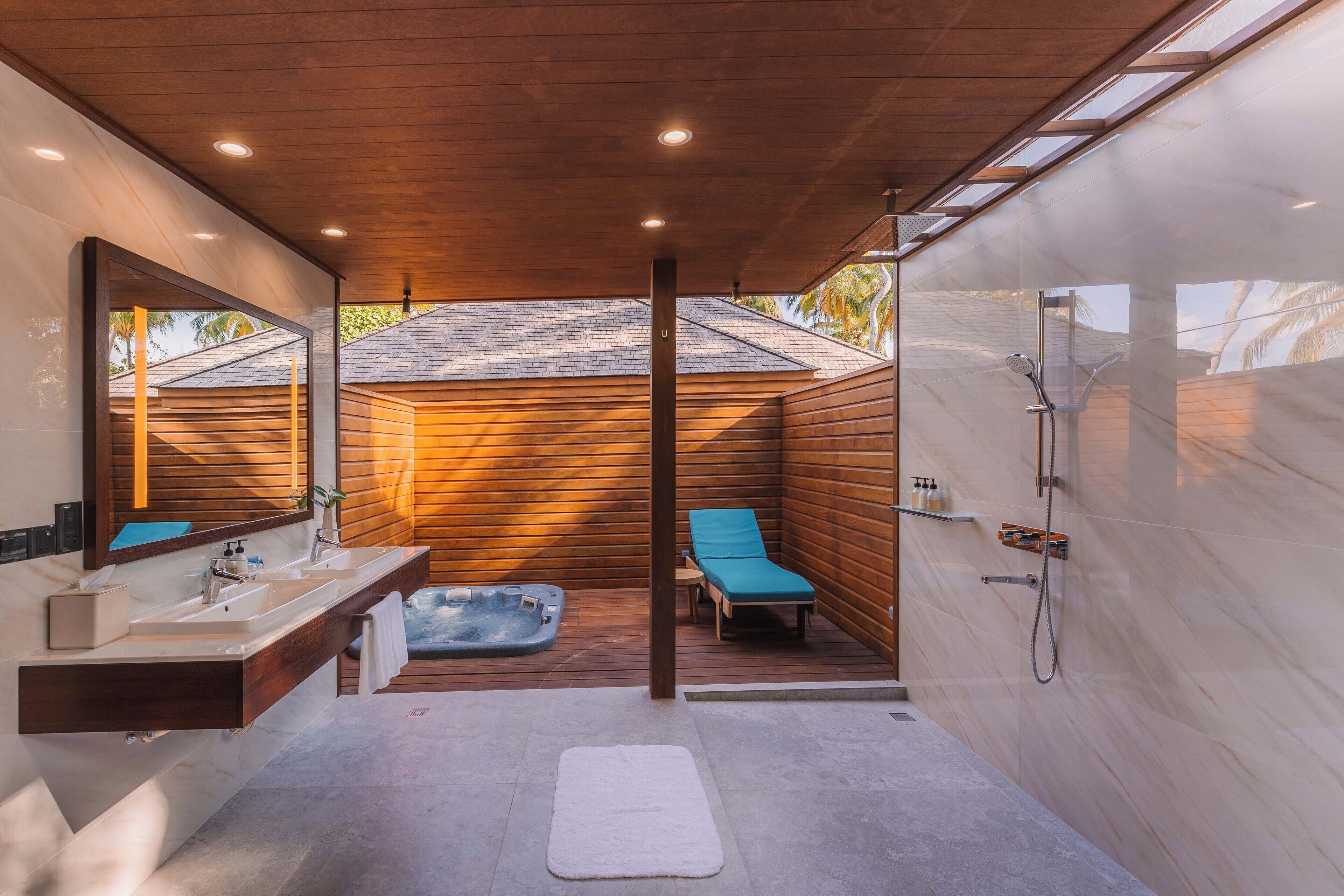 beach villa | bathroom | shower, rainfall showerhead, free toiletries, hair dryer