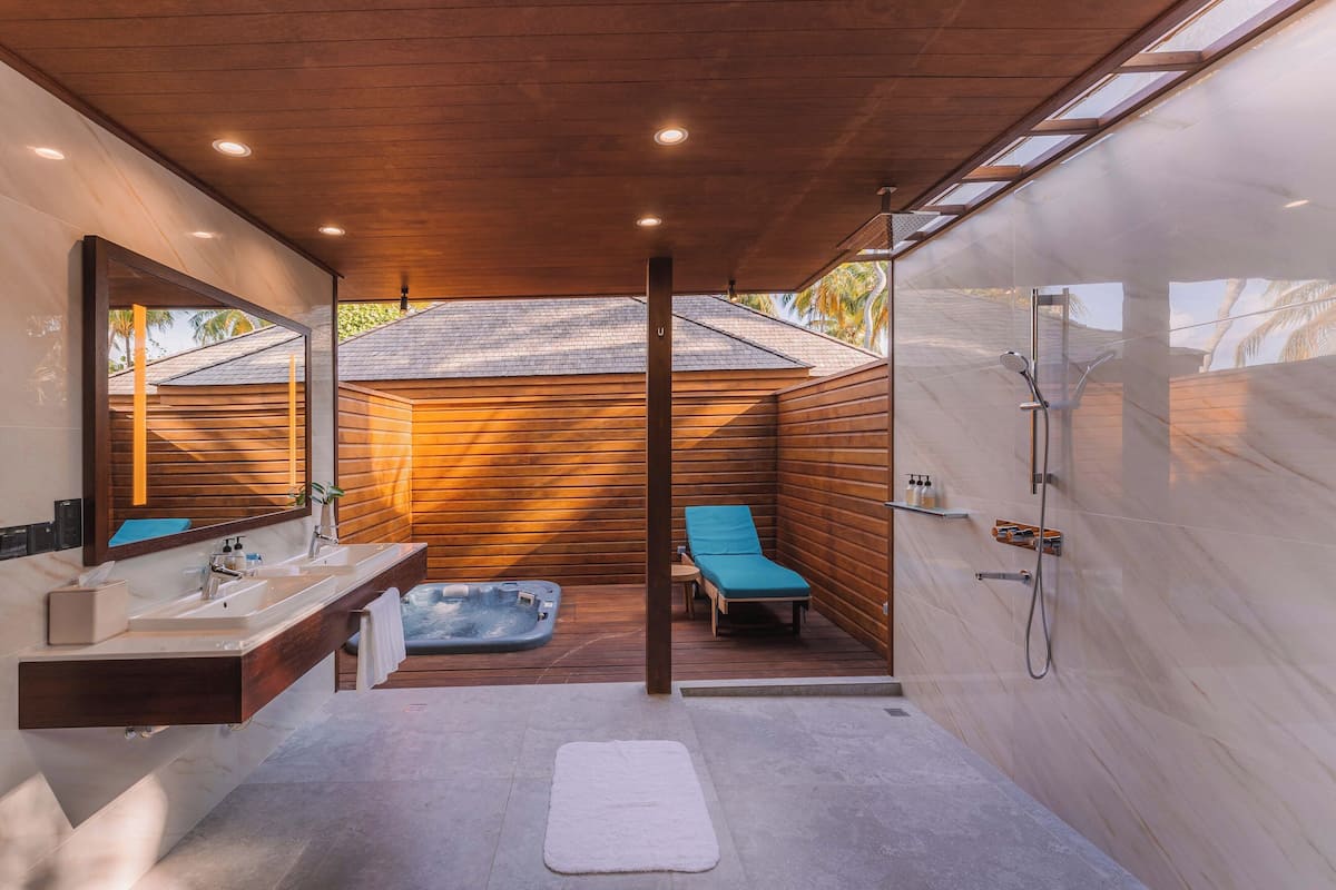 beach villa | bathroom | shower, rainfall showerhead, free toiletries, hair dryer