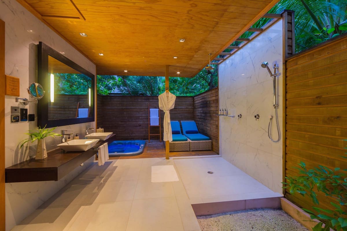 jacuzzi beach villa | bathroom | shower, rainfall showerhead, free toiletries, hair dryer