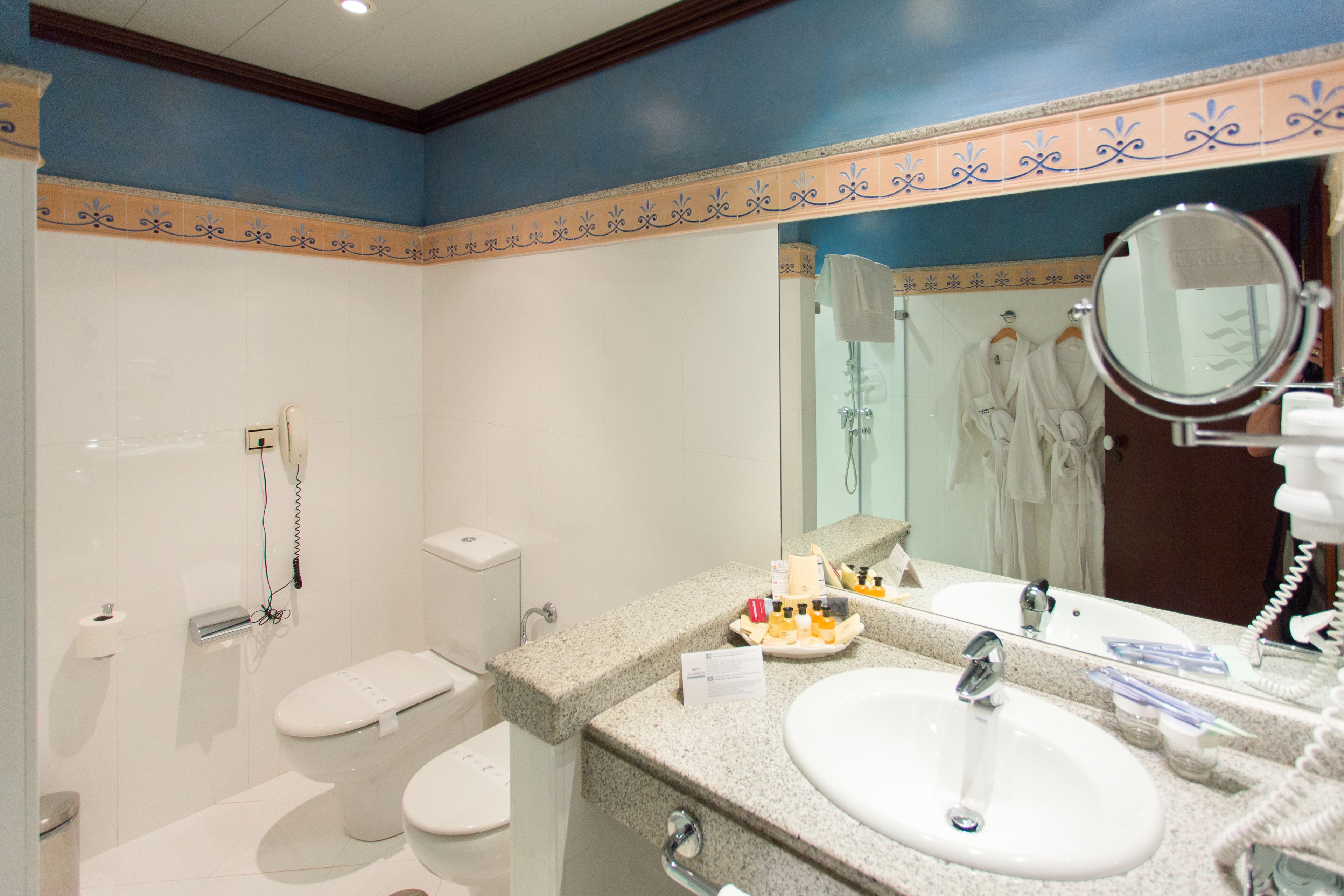 free toiletries, hair dryer, towels, shampoo