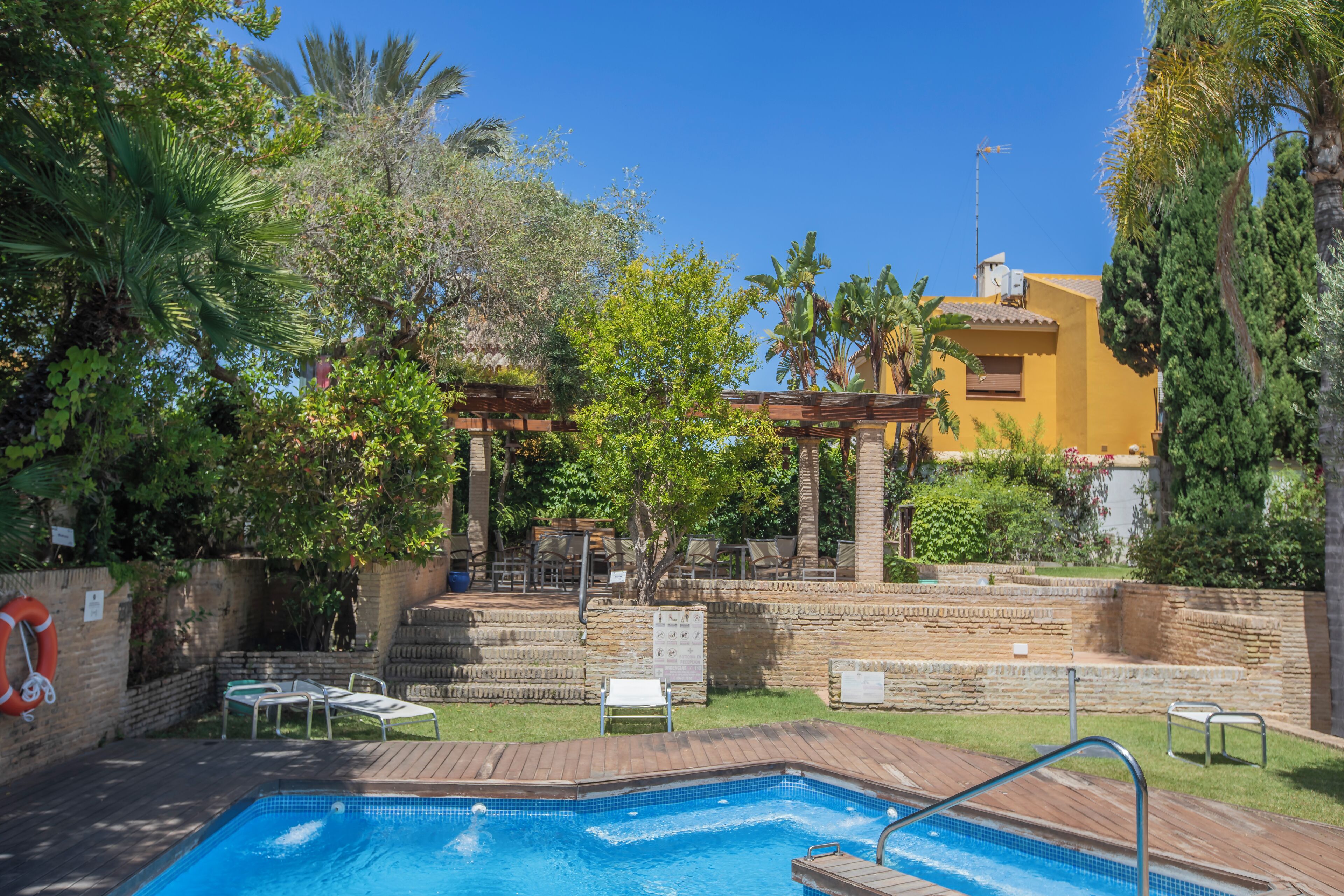 indoor pool, seasonal outdoor pool, pool umbrellas, pool loungers