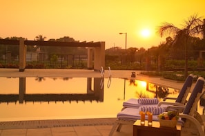 Outdoor pool, pool umbrellas, pool loungers