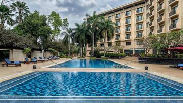 Outdoor pool, pool umbrellas, sun loungers