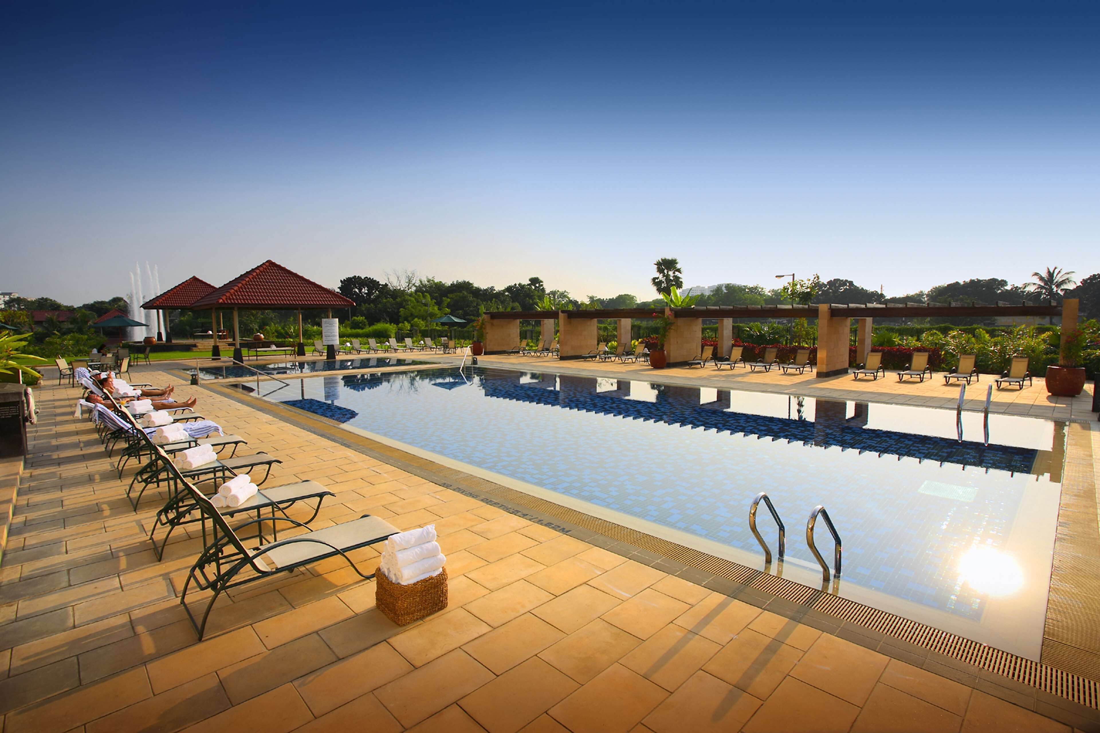 Outdoor pool, pool umbrellas, sun loungers