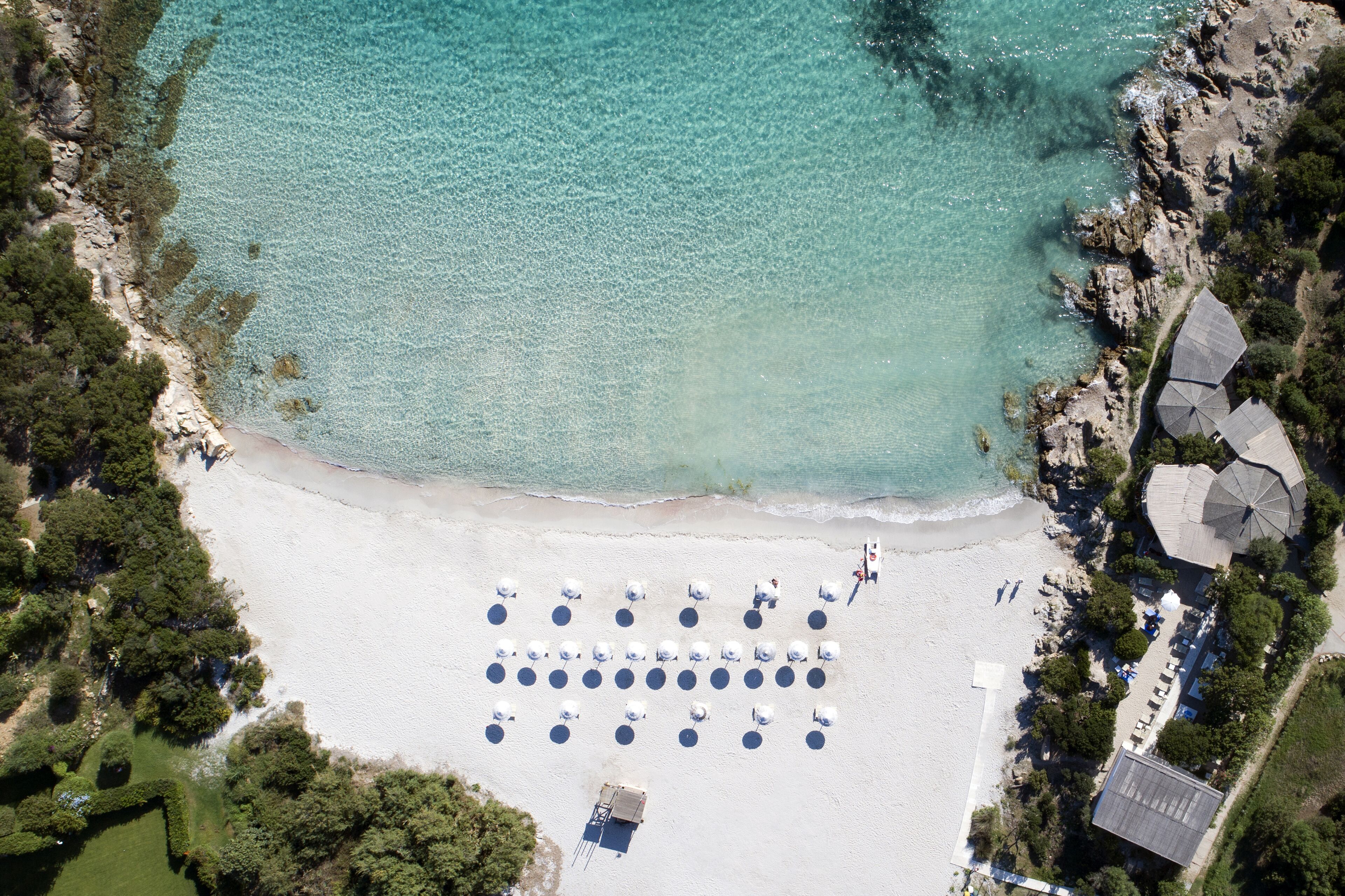 On the beach, sun-loungers, beach umbrellas, beach towels
