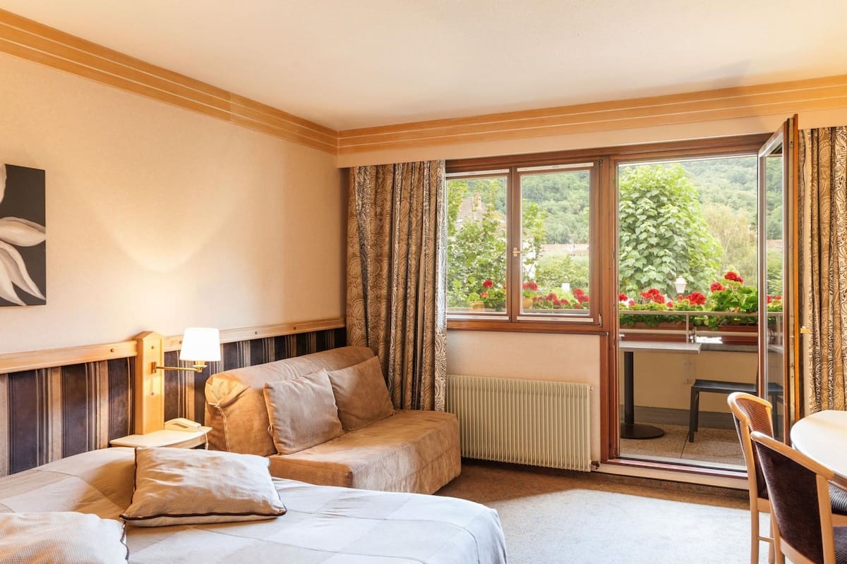 Quadruple Room | Minibar, desk, blackout drapes, soundproofing