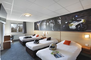 A hotel room with two beds, a desk, and a large motorcycle racing poster on the wall. - Le Relais des Puys (Orcines)